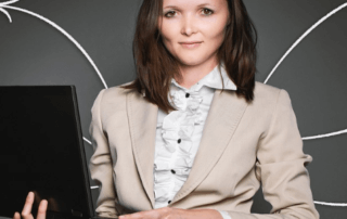 business woman holding computer